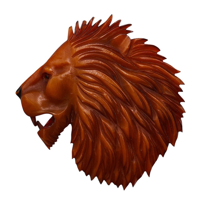 Art Deco Asprey lion’s head brooch pendant, sterling silver gilt and Bakelite
