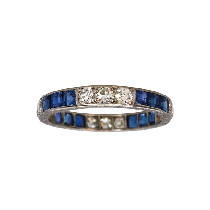 Elegant Art Deco platinum eternity ring with sapphires and diamonds