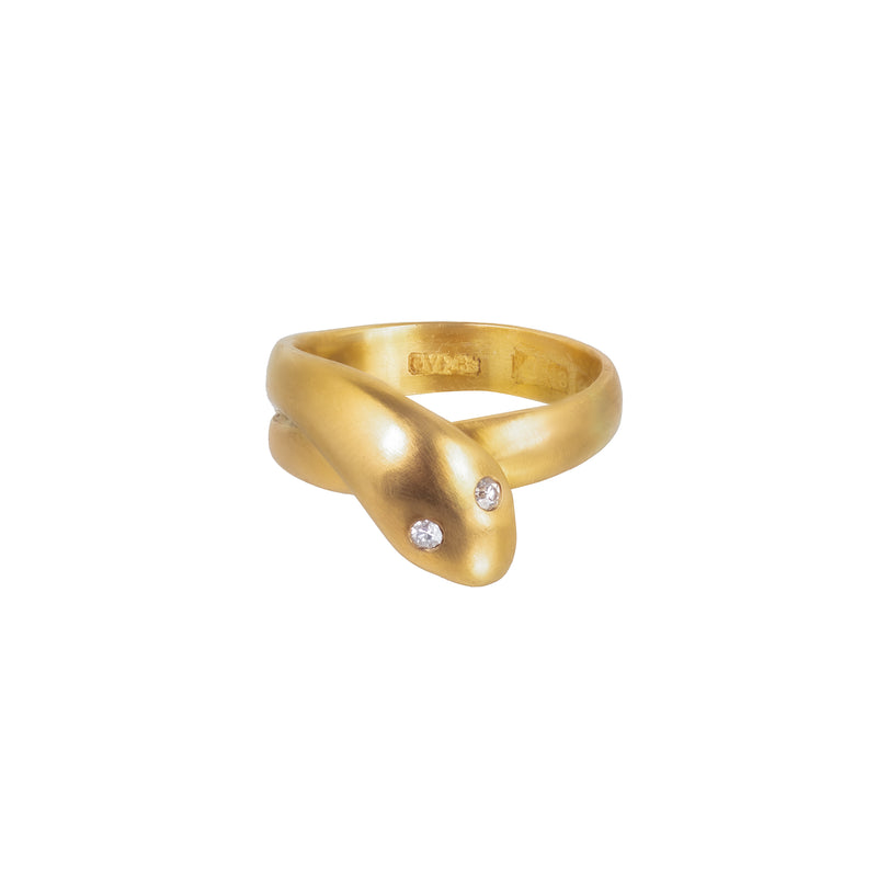 Victorian 18ct gold snake ring from 1906 with old cut diamond eyes, antique serpent jewellery symbolising eternal love and handcrafted in brushed gold.