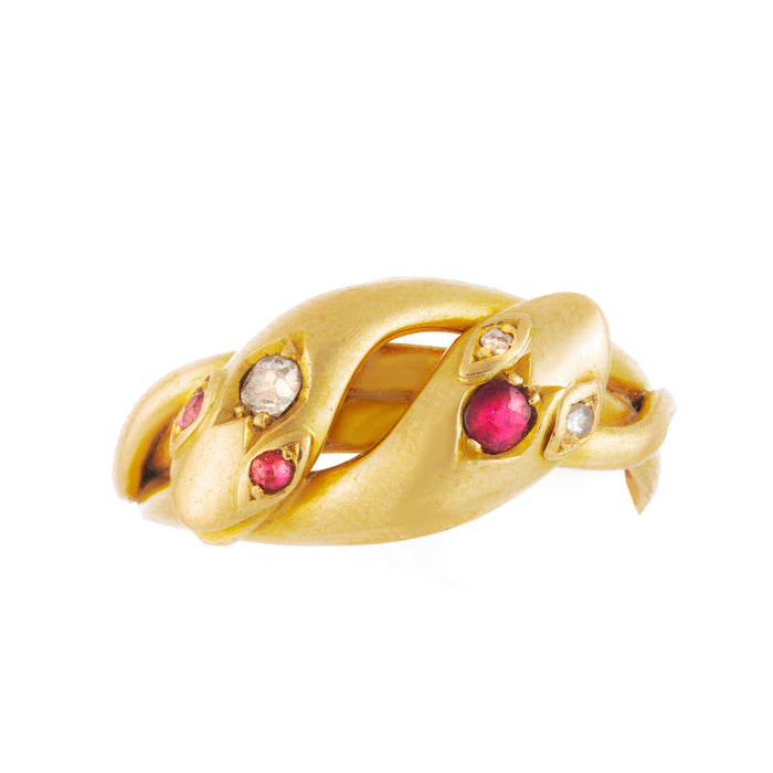 Front view of antique ruby and diamond snake ring in 18ct gold, early 1900s British design.