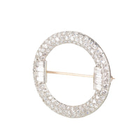 Art Deco diamond circle brooch in platinum and 18ct gold, pavé set with old European and baguette cut diamonds, c.1920s, side view