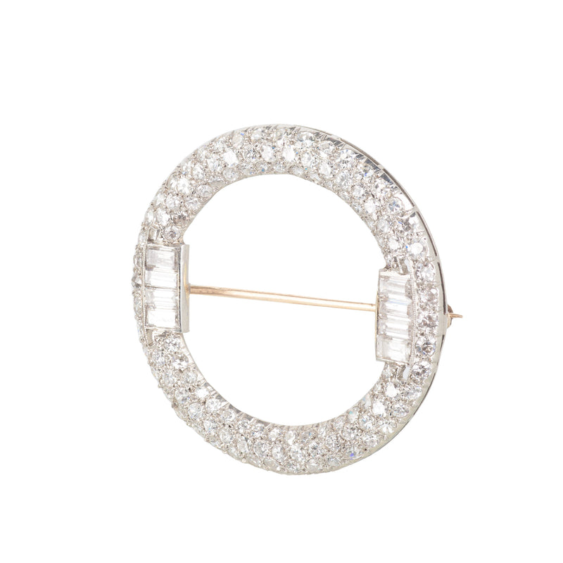 Art Deco diamond circle brooch in platinum and 18ct gold, pavé set with old European and baguette cut diamonds, c.1920s, side view