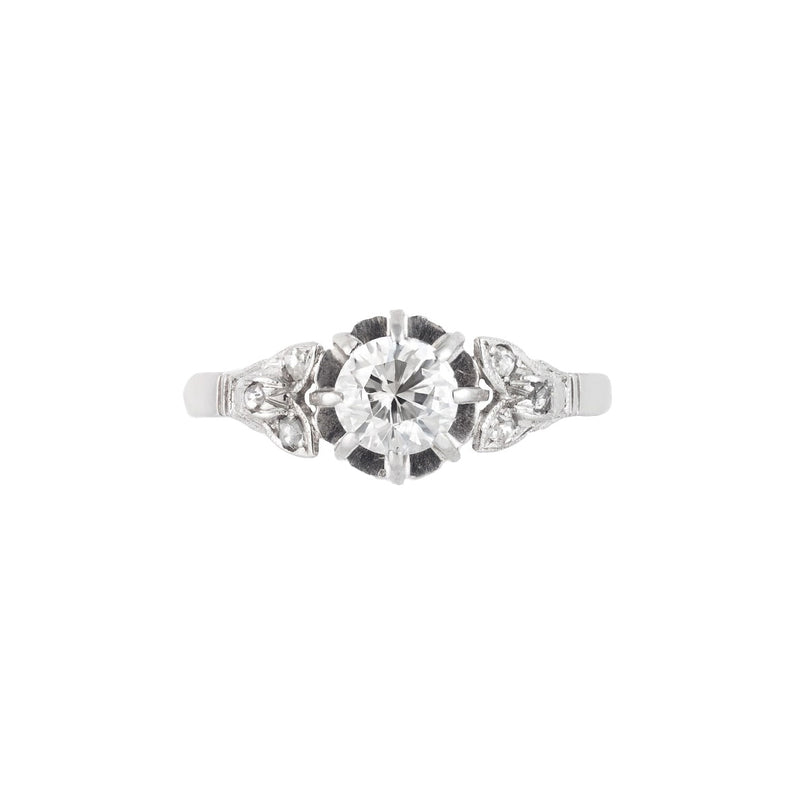 Art Deco old cut diamond platinum ring, c.1920s, featuring a 0.50ct centre diamond with rose cut diamond floral shoulders.