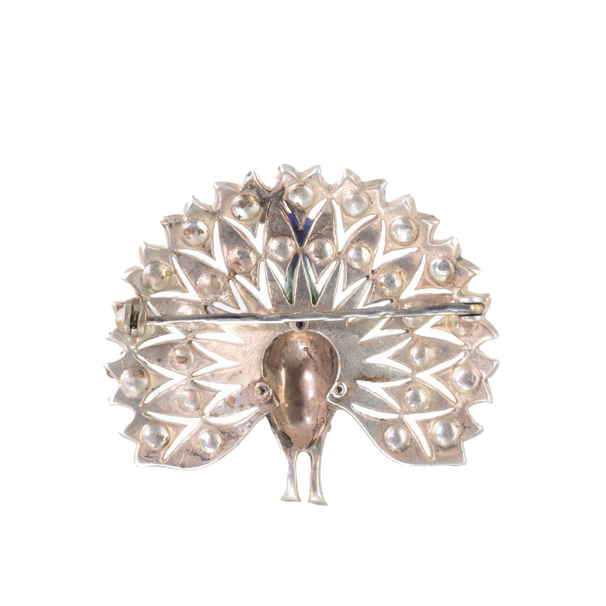 Back: Reverse view of 1930s Art Deco peacock brooch in sterling silver with paste stone setting and clasp detail