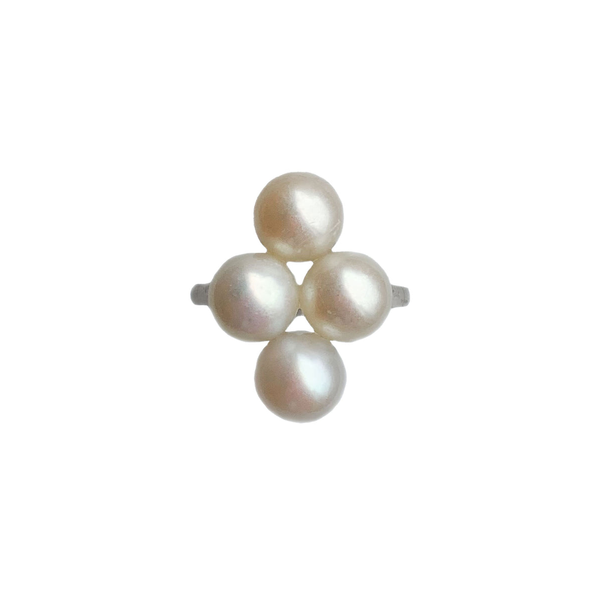 Art Deco platinum ring c.1920s set with four cultured pearls, English design hallmarked PT, front view.