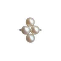 Art Deco platinum ring c.1920s set with four cultured pearls, English design hallmarked PT, front view.
