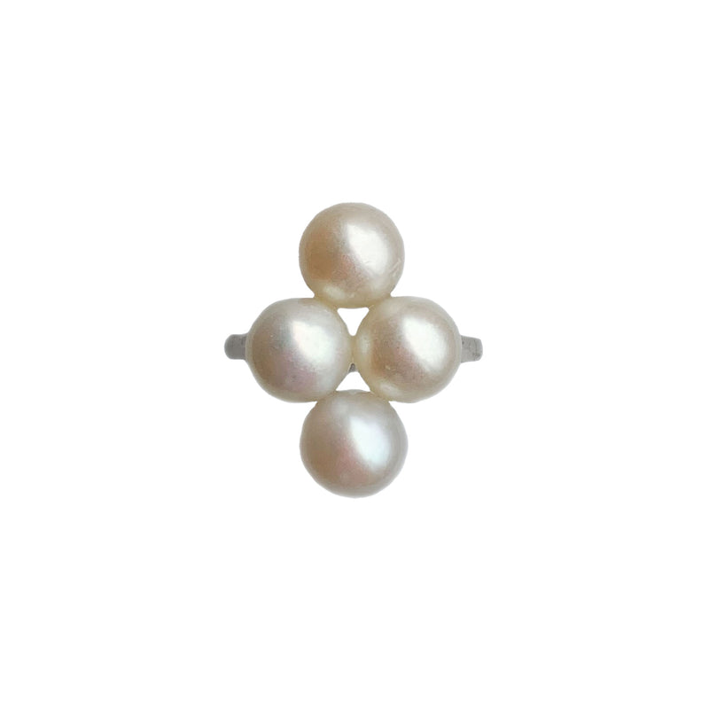 Art Deco platinum ring c.1920s set with four cultured pearls, English design hallmarked PT, front view.