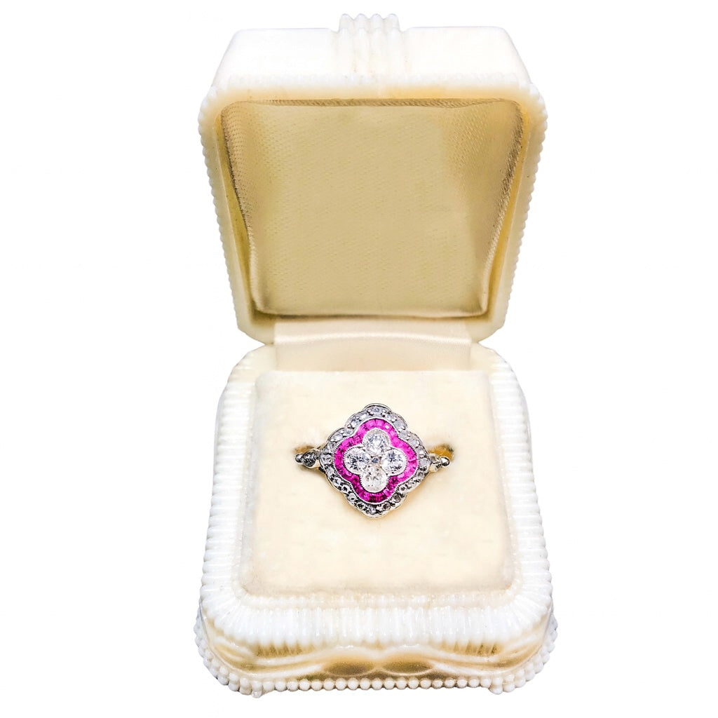 Art Deco ruby and diamond cluster ring c.1920s in platinum and 18ct gold, displayed in jewellery display box.