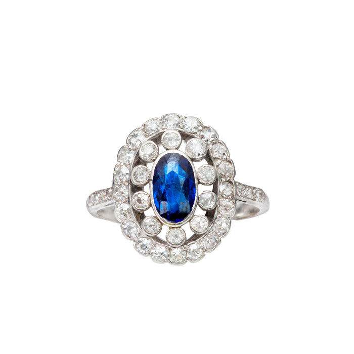 Art Deco sapphire and diamond engagement ring c.1930, platinum setting with 0.72ct sapphire and 0.70ct diamond halo, front view