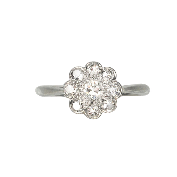 1950s daisy diamond cluster ring in 18ct white gold and platinum, old cut diamonds approx 0.50ct total, flowerhead design, front view.