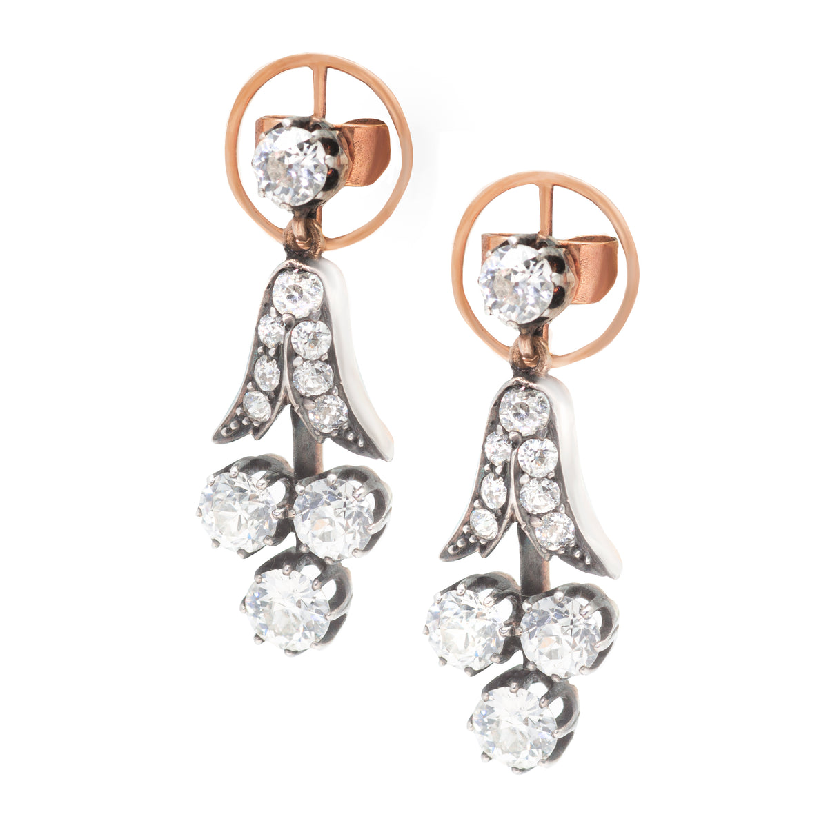 Front view of Edwardian Lily of the Valley diamond drop earrings, c.1910s, set with approximately 3.6 carats of old European cut diamonds in silver topped 15ct gold, showing the elegant floral openwork design.