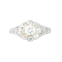 Edwardian diamond daisy cluster ring c.1910 with old cut diamonds totalling 1.10 carats, platinum mount and 18ct gold shank, front view.