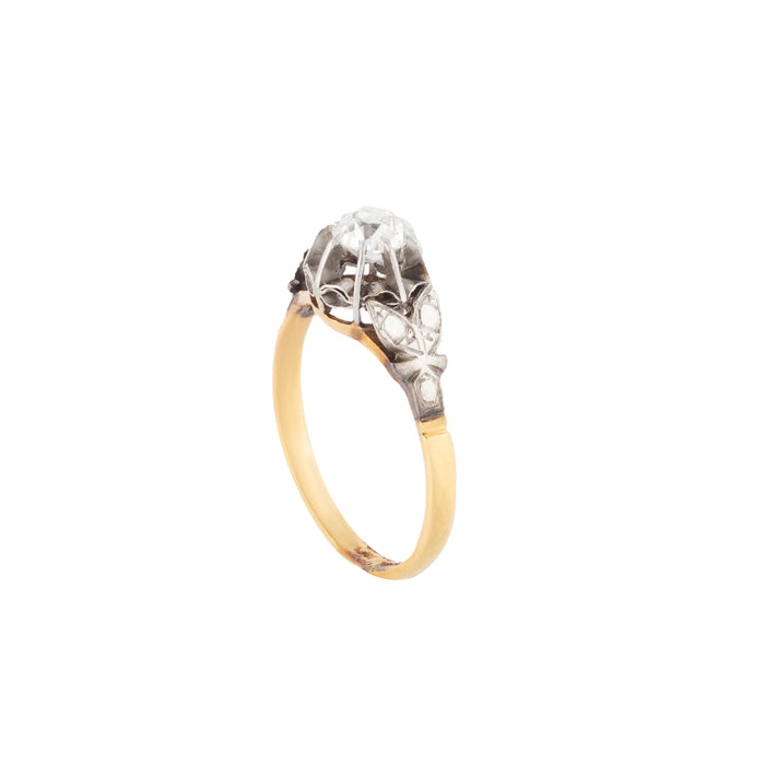 Side view of late Edwardian old cut diamond ring, platinum setting with 18ct gold band, c.1920s.