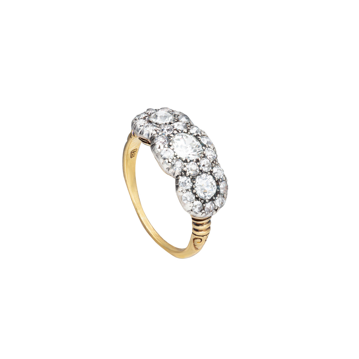Antique 18ct gold and platinum diamond ring showing raised triple cluster setting with antique cuts and decorative detailing, Edwardian period c.1910.