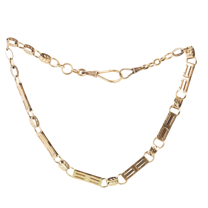 14ct gold fancy link chain with decorative engraved panels and swivel clasp, European circa 1980s, shown in full length against white background.