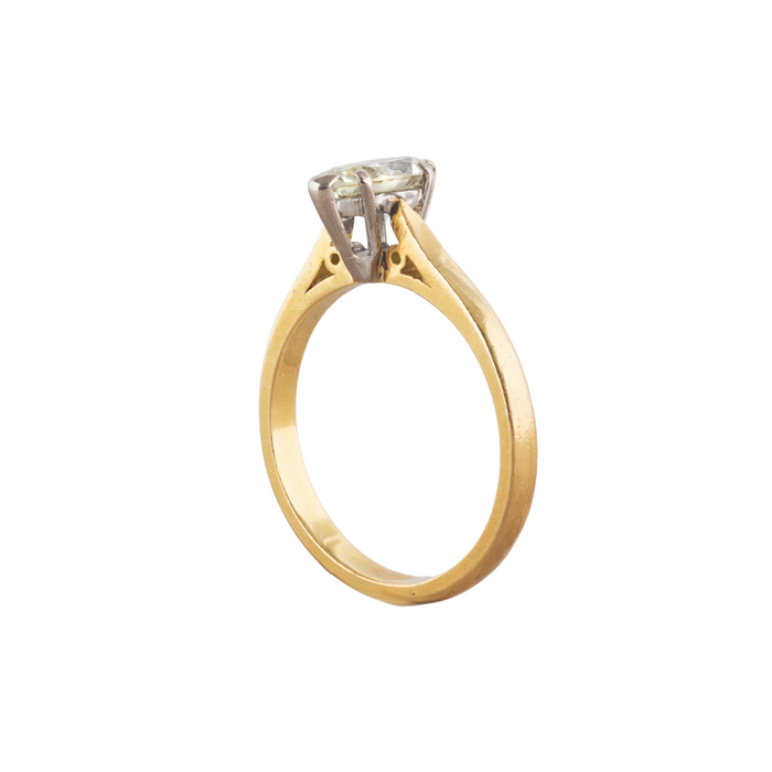 Profile view of 1990s English marquise diamond solitaire ring, 18ct yellow gold band with platinum tipped claw setting and open gallery