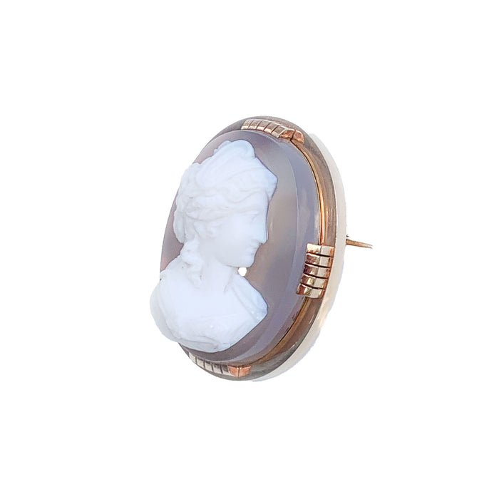 Side profile of a French 19th century agate cameo pendant brooch, 18ct gold mount with deep relief carving of a classical female.