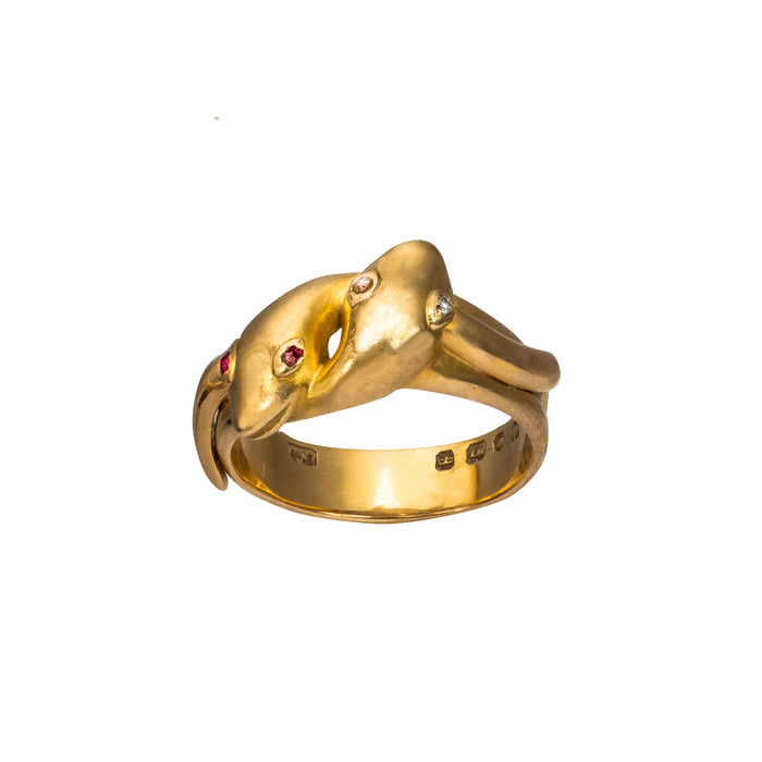 Antique gold snake ring with ruby and diamond eyes, front view showing hallmarks, c.1925.