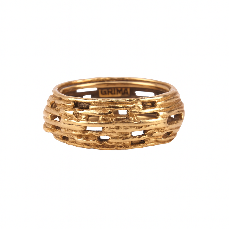 Front view of a vintage 18ct gold textured ring by Andrew Grima, showing the sculptural openwork design characteristic of the 1970s.