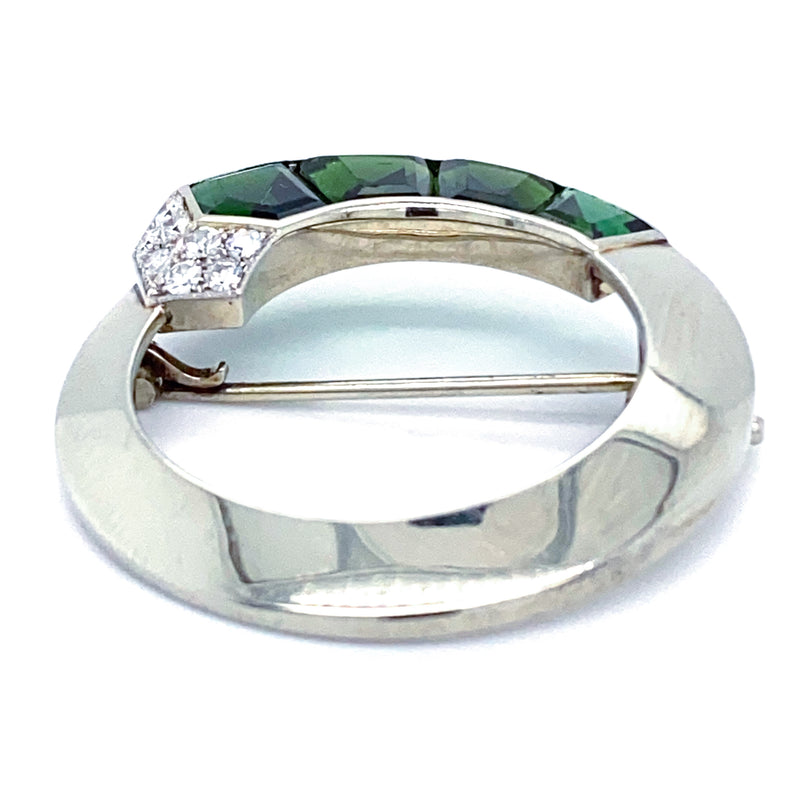 Reverse view of Gübelin 1930s tourmaline and diamond brooch, showing 18ct white gold circular frame and pin fitting.
