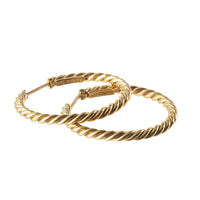 Cartier 1970s 18ct gold rope hoop earrings, laid flat.