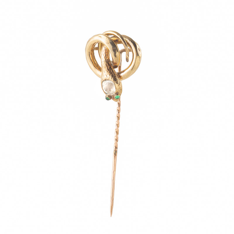 Coiled gold snake tiepin with green paste eyes