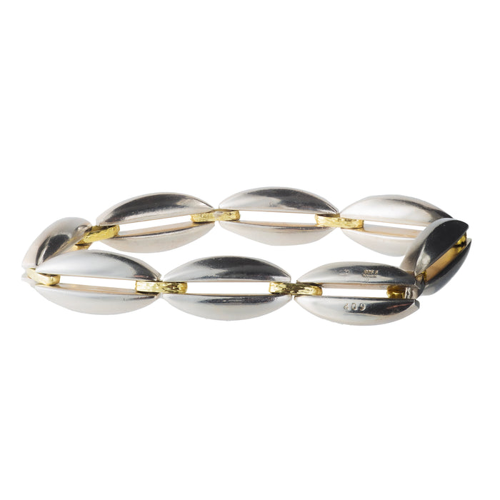 1980s Regitze Overgaard bracelet in sterling silver with 18ct gold connectors, design no. 409 for Georg Jensen, sculptural Danish jewellery.