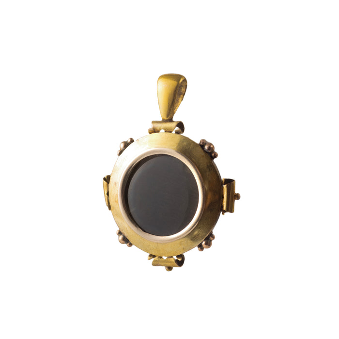 Rear view of antique agate locket showing gold setting