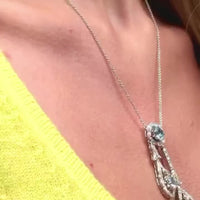 Vintage necklace with dual drop design, aquamarines and diamonds