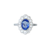 1960s sapphire and diamond cluster ring in 18ct white gold with a Ceylon sapphire and diamond halo, front view
