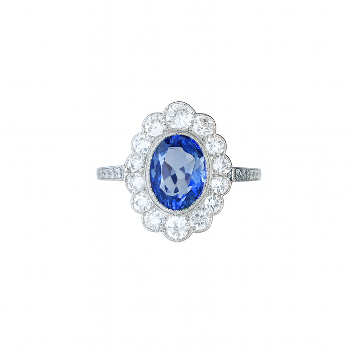 1960s sapphire and diamond cluster ring in 18ct white gold with a Ceylon sapphire and diamond halo, front view