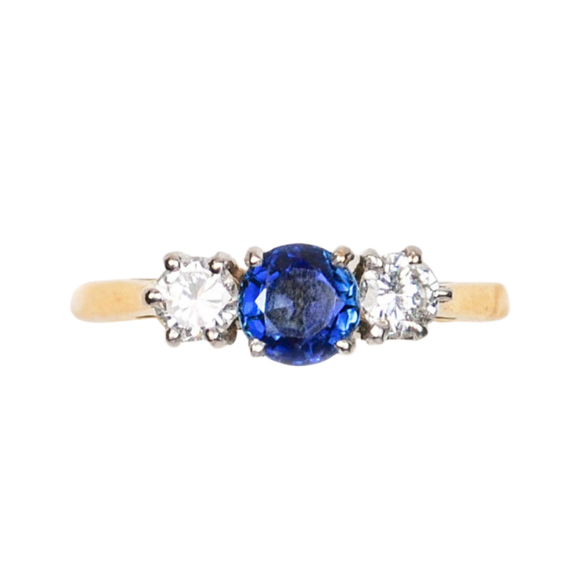Sapphire and diamond three stone ring in 18ct gold and platinum, British c.1960s