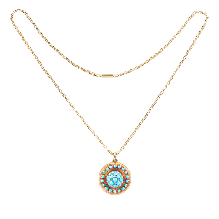 Full view of Victorian turquoise and diamond Etruscan Revival locket in 15ct gold, English c.1880s by Hancocks of London.