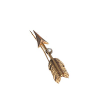 Side angle of 1940s 18ct gold arrow brooch with pearl detail and engraved feather design
