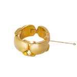 A Chunky Gold Plated Metal Bracelet