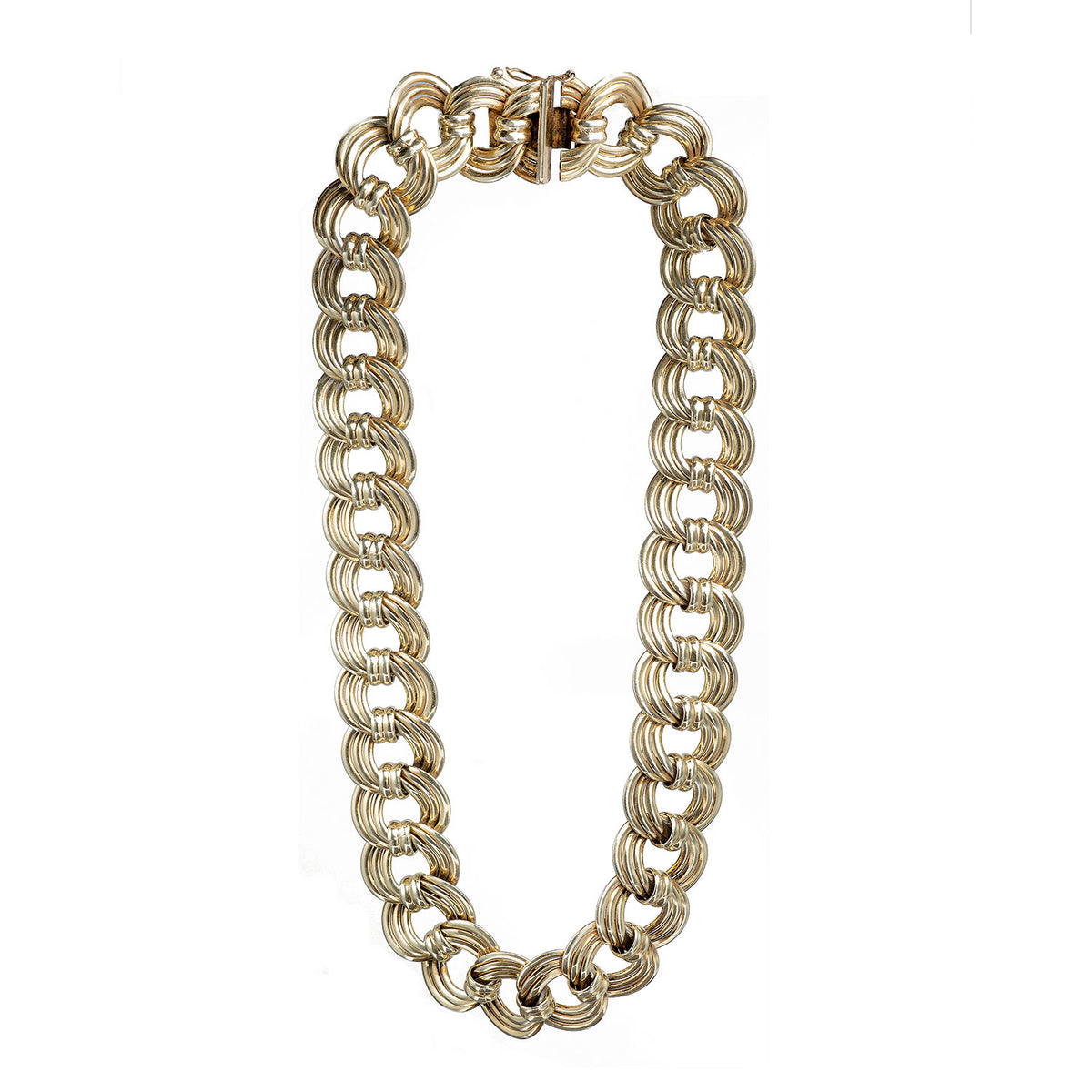 Full view of bold German silver gilt necklace from the 1960s, showing interlocking modernist design