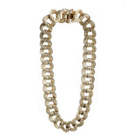 Full view of bold German silver gilt necklace from the 1960s, showing interlocking modernist design