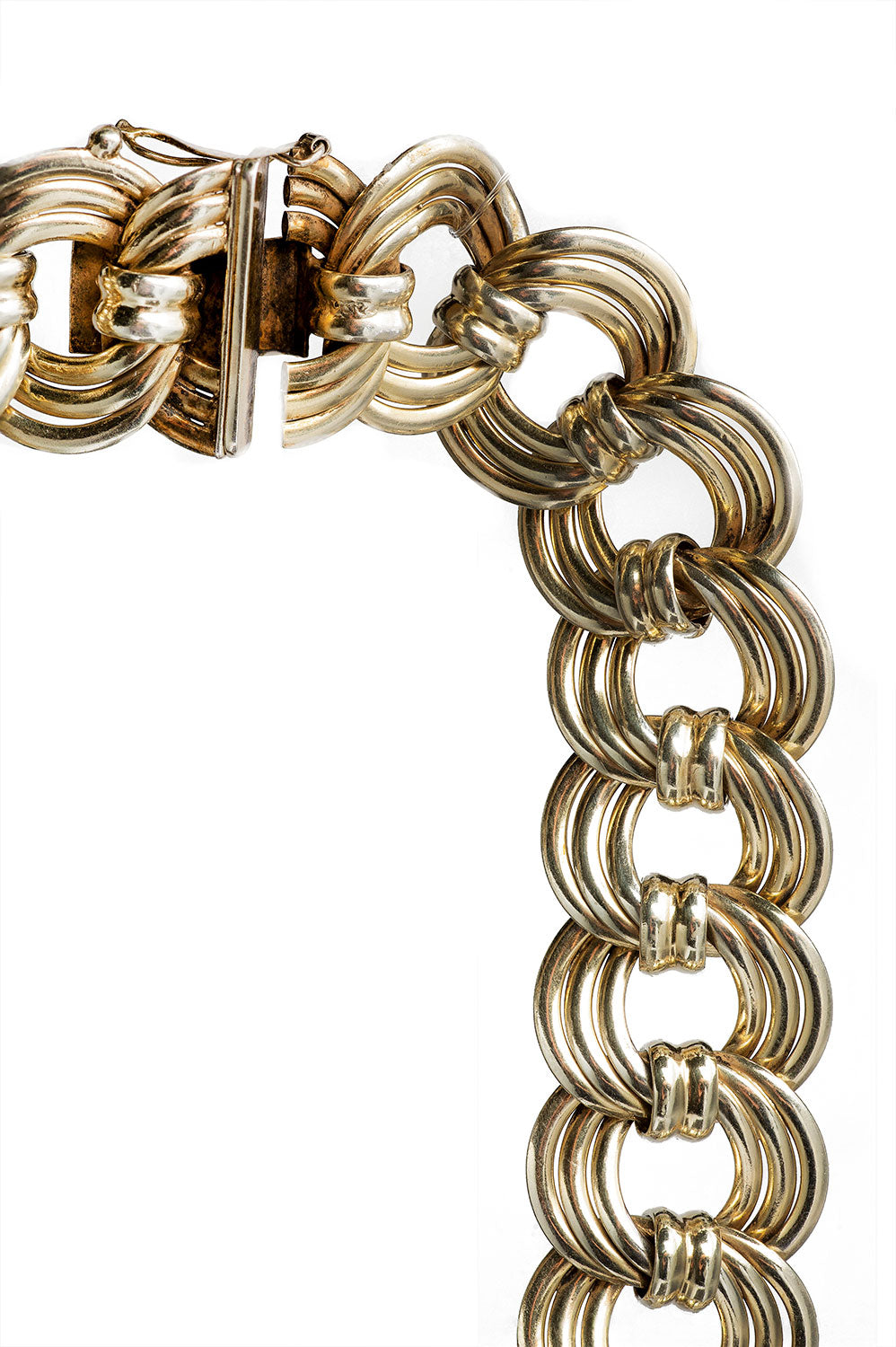 Close-up of 1960s silver gilt necklace with sculptural curved links in 835 silver