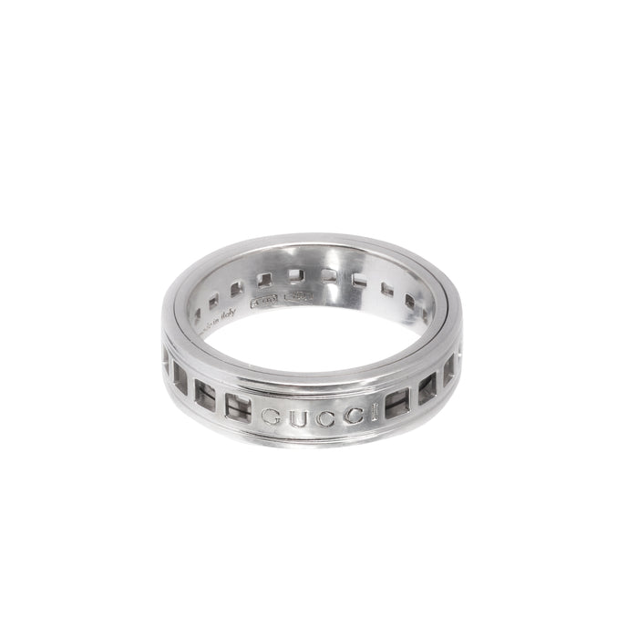 Close-up of hallmarks inside Gucci spinning ring: 750, Made in Italy, and size 13