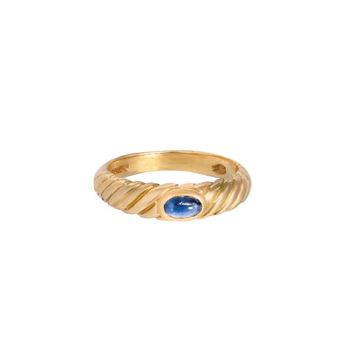 Cabochon sapphire ring set in fluted 18ct yellow gold with smooth bezel setting, London hallmark visible