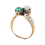 An Emerald and Diamond Toi et Moi ring