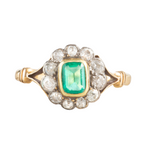 An Emerald and Diamond Halo ring