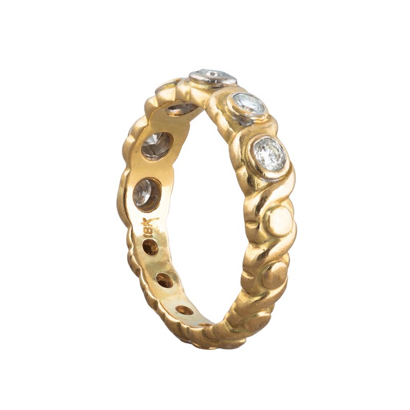 A Gold six stone Diamond ring band