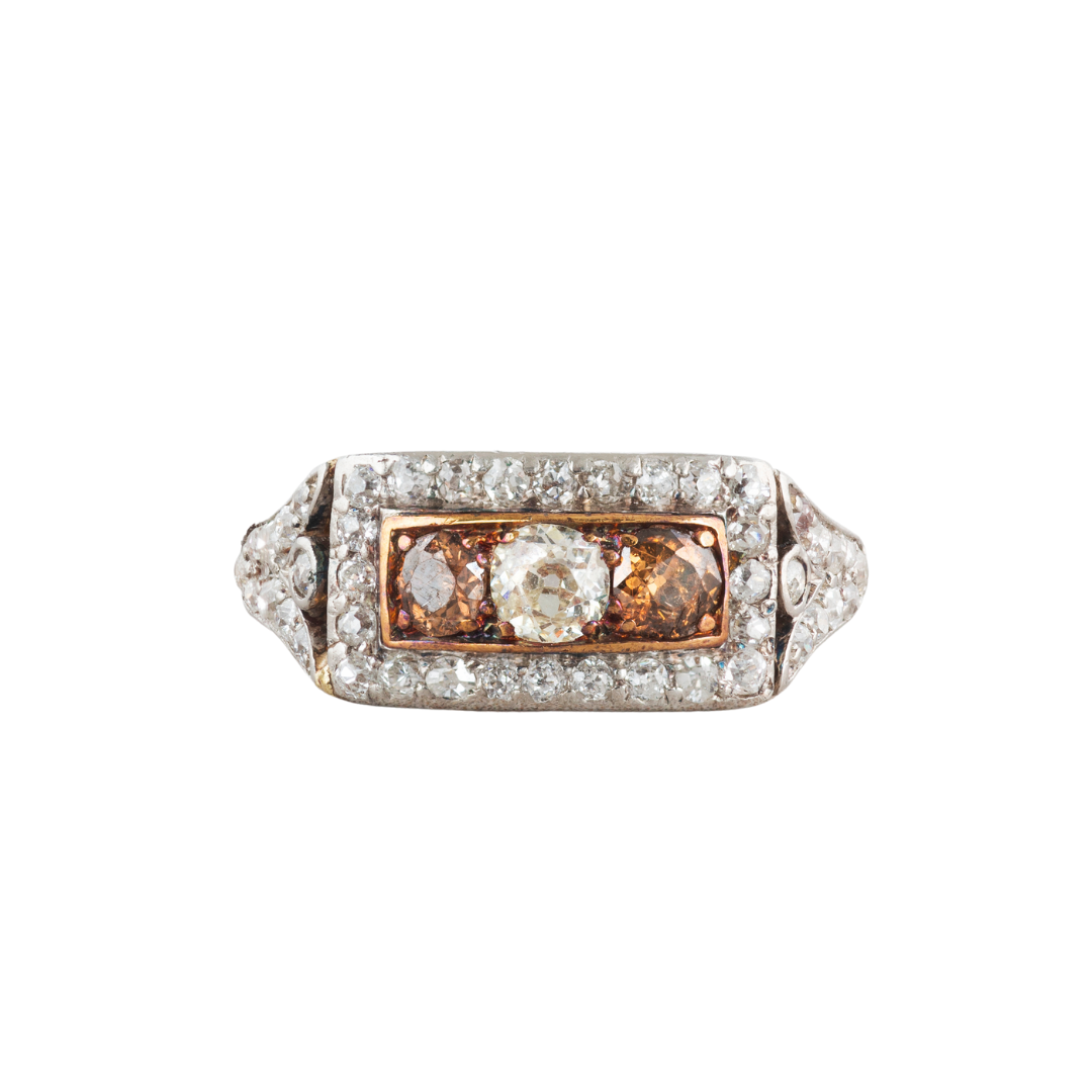 A Cognac Diamond Gold Ring