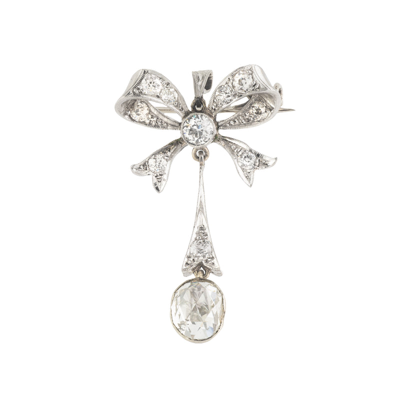 A Platinum Diamond Bow Pendant