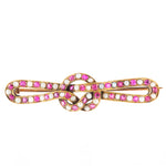 A Ruby Pearl Love Knot brooch