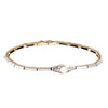 An Eighteen Carat Gold, Platinum, and Natural Pearl Bracelet