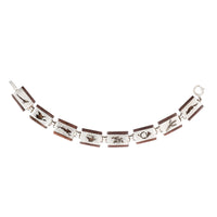 Mid-century silver and wood bracelet with engraved alpine hunting motifs, c.1950s