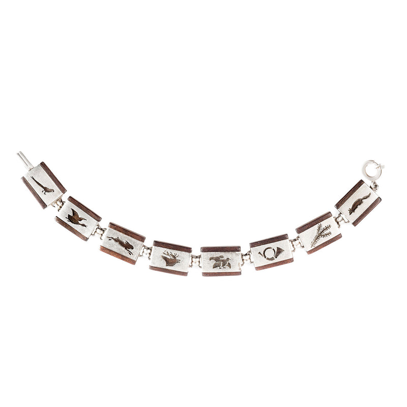 Mid-century silver and wood bracelet with engraved alpine hunting motifs, c.1950s