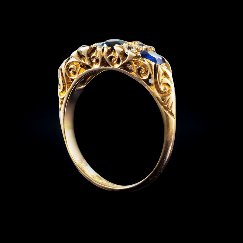 A three Sapphire Diamond Ring